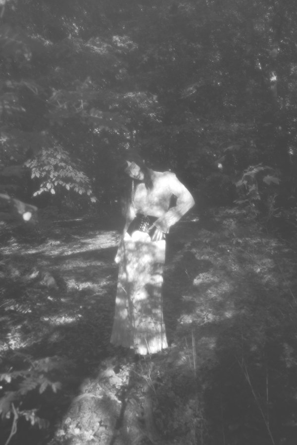 Lindred double-exposure portrait in forest, black and white